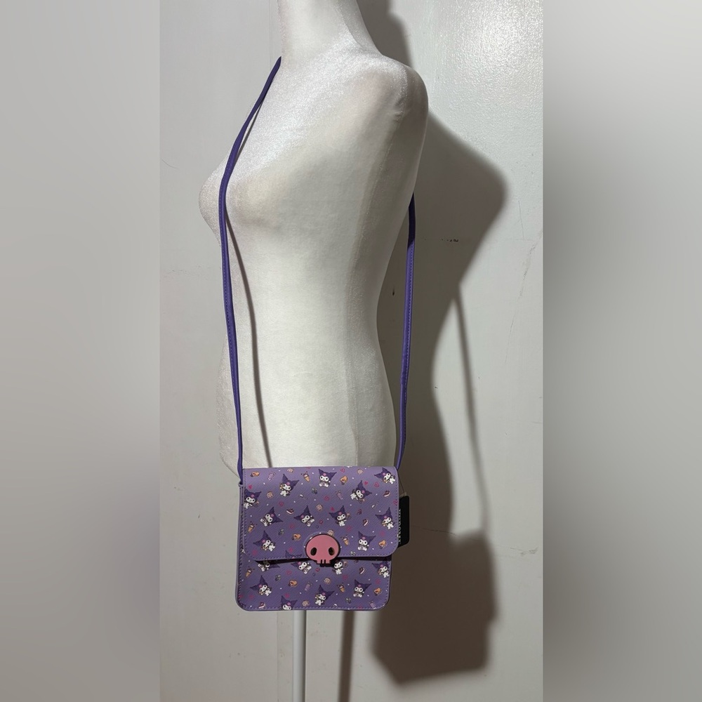 Sanrio Kuromi Crossbody Bag. purple color scheme and a pattern of Kuromi.